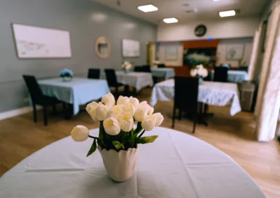 Flowers on a table in the dining room at Glendale Healthcare Center