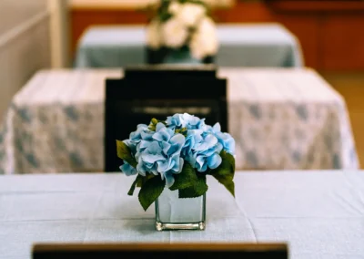 A vase of flowers on a table at Glendale Healthcare Center