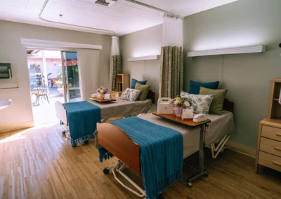 Two beds in a semi-private room at Glendale Healthcare Center
