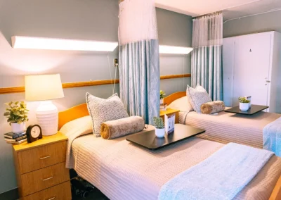 A semi private bedroom at Valley Palms