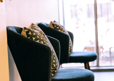 Two chairs in a room at Valley Palms