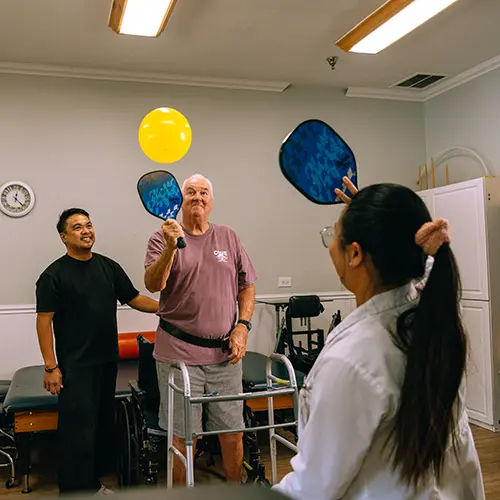 An elderly man doing occupational therapy at Casitas