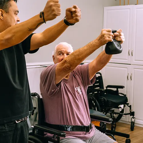 An elderly man doing therapy at Casitas