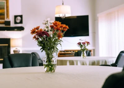 Flowers on a dining room table at Casitas Care Center