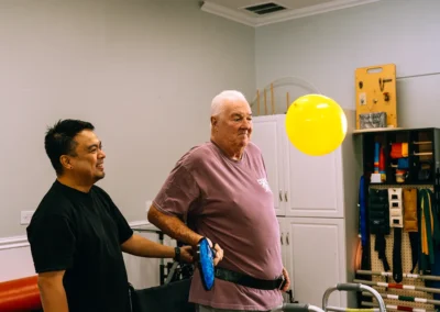 An elderly man doing physical therapy at Casitas Care Center