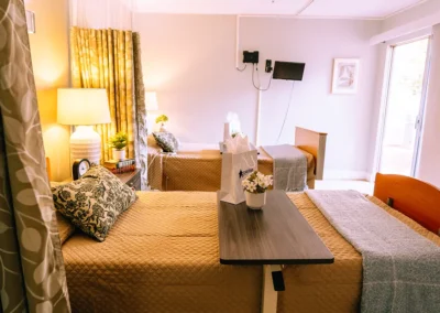 Two beds in a room at Casitas Care Center