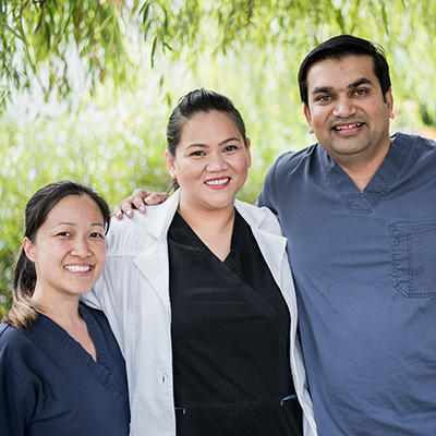 Three nurses smiling