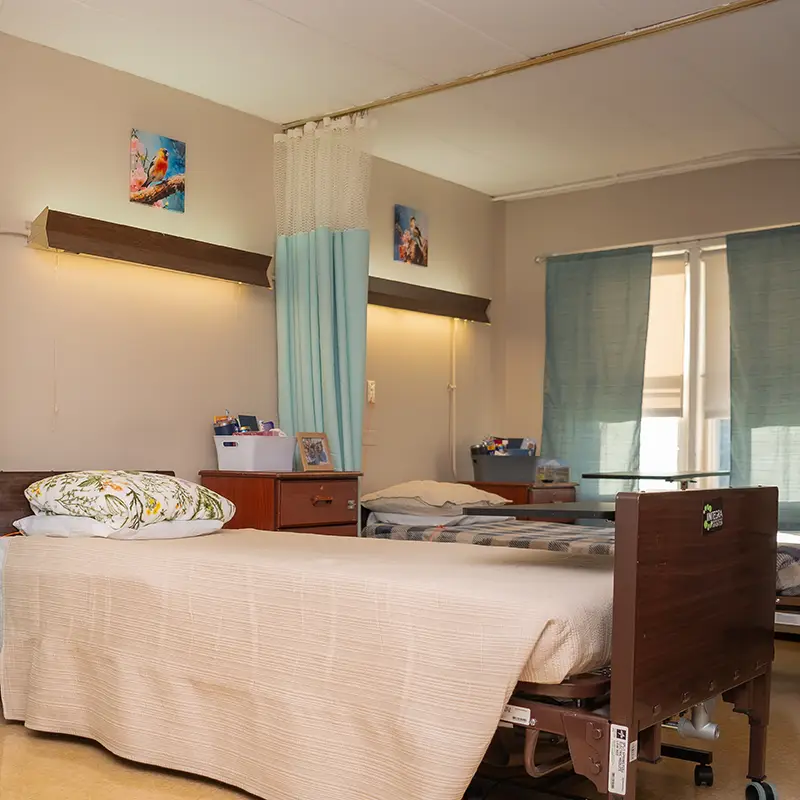 A resident's bedroom at Hickory Village