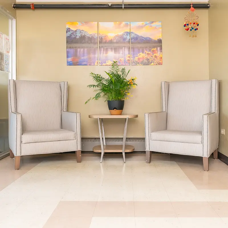 Two armchairs in the lobby of Hickory Village