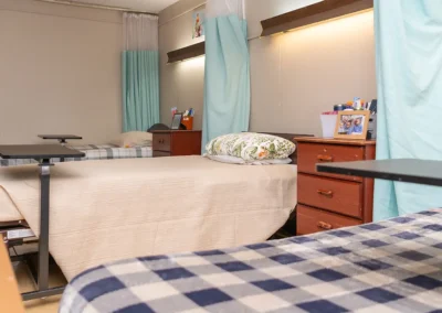 Three beds in a room at Hickory Village