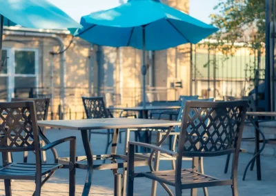 Tables and umbrellas in the courtyard of Hickory Village