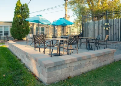 Tables next to grass outside of Hickory Village