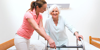 yolo-400x200-42 caregiver with an elderly woman to walk