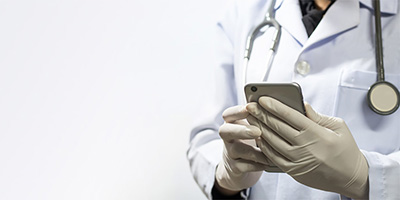 yolo-400x200-87 doctor on a cell phone