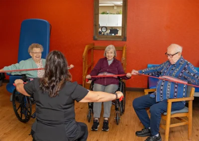 Rehabilitation session at the Farmington Village Nursing and Rehabilitation Center with trees