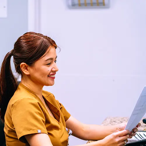 A nurse holding a paper at Mountain View