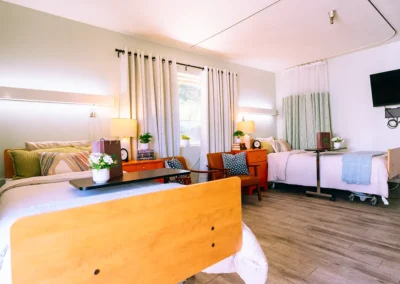 A semi private bedroom with windows at Mountain View