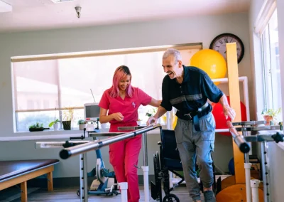 A physical therapist doing therapy with an elderly man Mountain View